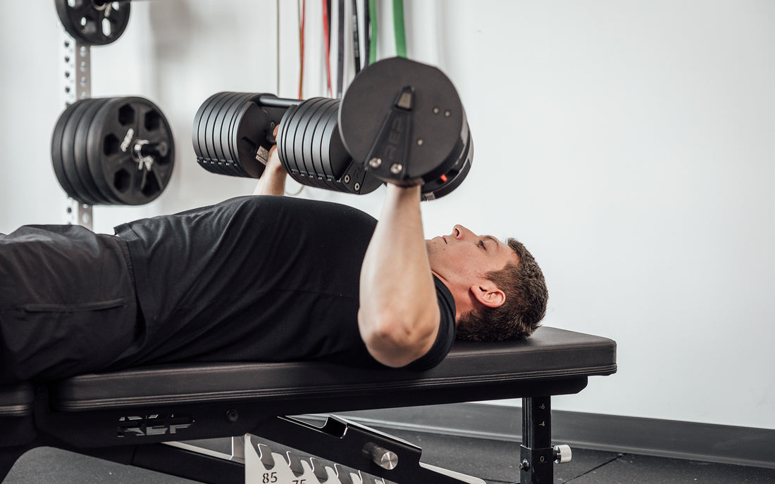 Barbell vs Dumbbell Bench Press: Which Builds More Muscle Mass?